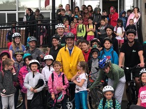 BRUCE BELL/THE INTELLIGENCER
Mayor Taso Christopher (yellow jacket) is pictured with students from Belleville’s Prince Charles Public School on Wednesday morning during the second annual Mayor’s Ride.