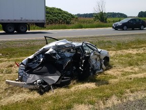 Charges are pending after a tractor-trailer rear-ended a vehicle on Highway 401 near Kenesserie Road on Tuesday. (Handout)