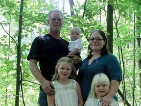 Community members identified the victims of the early Monday morning house fire in this family photo taken last fall as John Kramer Jr., and daughters Shailyn, 9, and Britnee, 5. Dillon, 15 months, survived, as did his mother, Lindsy Mitchell, who was in a London hospital Wednesday, June 13, 2018. (Monica Graham Photography)