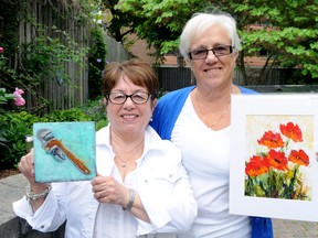 Local artists Roxanne Jervais (left) and Toni Poole with their art in the gardens of Inspirit Residences on Baseline Road W. Jervais and Poole will be among the artists taking part in Inspirit’s Annual Art and Garden Show June 16. (CHRIS MONTANINI\LONDONER)