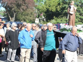 Feast day of St. Anthony of Padua is celebrated with procession from St. Gregory's Catholic Church on surrounding streets on Wednesday night.