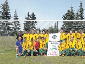 Canmore Collegiate High School Crusaders senior boys soccer team pose with the South Central Zone senior high boys soccer banner after winning the 2018 championship in Cochrane on Thursday.