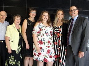 Sudbury Star Sports editor Bruce Heidman, right, received a Special Recognition Award at the 50th annual Greater Sudbury Sports Hall of Fame Sports Celebrity Dinner, held at the Caruso Club on Wednesday, June 13, 2018. Heidman is pictured with his father Gerry, left, mother Diane, wife Colleen and daughters Camryn and Sydney. Ben Leeson/The Sudbury Star/Postmedia Network