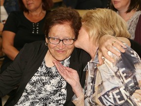 Rosina Bruno, left, mother of the late Sam Bruno, and his wife, Cheryl Bruno, share a moment at a celebration marking the launch of construction of Health Sciences North's Positron Emission Tomography (PET) Scan Suite in Sudbury, Ont. on Wednesday June 13, 2018. The suite is being built on stilts at the back of the hospital that faces Paris Street. John Lappa/Sudbury Star/Postmedia Network