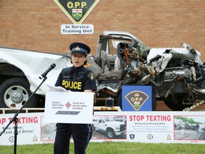 John Lappa/Sudbury Star/Postmedia Network
Carmel McDonald, community safety officer with the Ontario Provincial Police, makes a point at the launch of the Sudbury Road Safety Committee's distracted driving campaign at OPP headquarters in Sudbury on Wednesday.