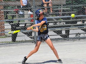 Alexis VanNetten of West Lynn takes a swing during the 'A' final of Tuesday's NPSAA Intermediate Co-ed 3-Pitch Tournament at Lions Park in Simcoe. After dropping their first two games, the Warriors ran the table, eventually beating Walsh 5-1 in the championship contest.
JACOB ROBINSON/Simcoe Reformer