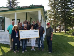 Back row: Reeve Glenn Shiskoski, Pat Mitchell, Enbridge construction manager Glen Stetsko, Fraser McIntosh, Al Thorleifson, Cassandra Morrow, Dale Baloun and Walter Mueller. Front row, Enbridge's Joanne Bradbury and Riley Handford, Bette Mueller, Enbridge's Mike Jespersen and Robert McLean. (SUPPLIED)