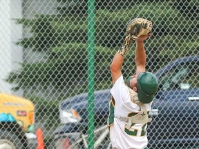 Sherwood Park Athletics catcher Mike Falkins tracks down a foul ball. The A's will be hosting a special community appreciation game on Friday at Centennial Park.  Photo courtesy Two Point Photography