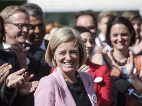 Alberta Premier Rachel Notley is applauded at a press conference after speaking about the Kinder Morgan pipeline project, in Edmonton on May 29.