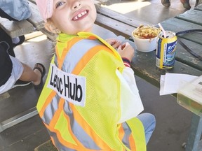 The Leduc Hub's youngest volunteer, nine-year-old Kaitlyn. She helped her grandmother sell raffle tickets at a Leduc Hub fundraising event to support the homeless. (Submitted)