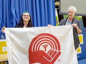 Caterina Dawson, left, was announced as this year's United Way campaign chair on Friday at École secondaire catholique de Pain Court. She's shown with Karen Kirkwood-Whyte, United Way of Chatham-Kent CEO. (Trevor Terfloth/The Daily News)