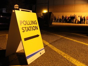 Voters line up at a polling station at Ecole McTavish School, less than 30 minutes before polls closed during the 2017 municipal election on Monday, October 16, 2017. Vincent McDermott/Fort McMurray Today/Postmedia Network