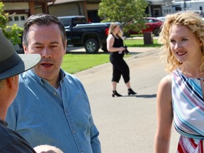 UCP Leader Jason Kenney and Fort McMurray-Conklin candidate Laila Goodridge speak with a supporter while campaigning in the Grayling Terrace neighbourhood of Fort McMurray, Alta. on Saturday, June 16, 2018. Vincent McDermott/Fort McMurray Today/Postmedia Network