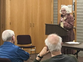 Workshop leader Jean Ray Baxter reads a story from one of the participants of the “Senior writers read their works” event at the Isabel Turner Branch of the Kingston Frontenac Public Library in early June. (Brigid Goulem/For The Whig-Standard/Postmedia Network)