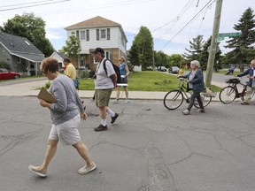 Residents of the Sunnyside and Alwington neighbourhoods in Central Kingston took a walk with a city planner through their neighbourhoods on Saturday to provide input for future developments, as part of the Central Kingston Growth Strategy. (Meghan Balogh/The Whig-Standard/Postmedia Network)