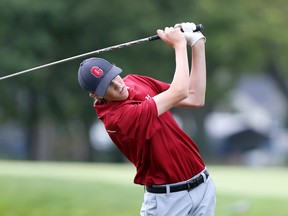 Garret Day of Chatham, Ont., tees off on the back nine during the Essex-Kent Junior Golf Tournament at Roseland Golf and Curling Club in Windsor, Ont., on Aug. 23, 2017. (NICK BRANCACCIO/Postmedia Network)