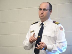 Aaron Floyd, Whitecourt deputy fire chief, presents during a community information night at École St. Joseph School on June 12 (Peter Shokeir | Whitecourt Star).