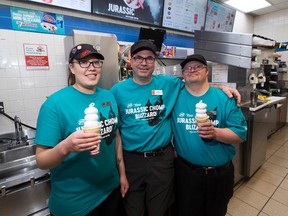 Mike Liber (middle) works with two of his employees with mental disabilities, Brittany St Savard (left) and Ryan Steedman (right), on Thursday, June 14 at his Baseline Road Dairy Queen location. 

Greg Southam/Postmedia Network