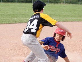 Mitchell's Ryan Klumper slides in safely at third base after tripling against Essex during the Jack Grasby Memorial Minor Mosquito Tournament last Friday, June 15 in Stratford. Mitchell won 11-9. CORY SMITH/POSTMEDIA NETWORK