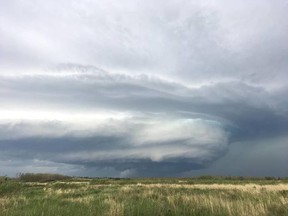 An ominous cloud hovered over Cold Lake before thunderstorms, hail and pouring rain hit the city Saturday night.