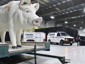 Tyler Wilson, right, spots Armor Pro Audio owner Bob Breen while he parks a trailer full of equipment inside the Rotary Complex for the Ontario Pork Congress on Monday, June 18, 2018 in Stratford, Ont. (Terry Bridge/Stratford Beacon Herald)