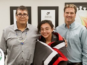 PHOTO SUBMITTED
Elder Leonard Cardinal standing beside Ryleigh Grant-Turner and GPPSD board chairman John Lehners