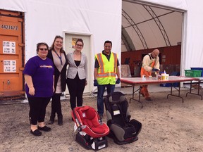 Safe Communities Kenora representatives Maria Bagbonas, Stephanie Charles and Shelby Smith with City of Kenora environmental services division lead Mukesh Pokharel and a selection of child safety seats now being accepted for disposal at the Household Hazardous Waste (HHW) depot. Safe Communities Kenora and the city have partnered to provide a regular drop off of unsafe, damaged or expired baby products.
Kerri Holder/City of Kenora