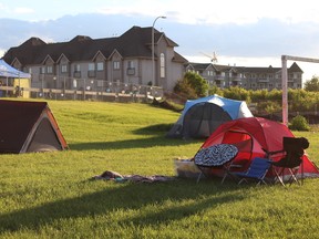 Participants in the Hope in the Dark event camp out in downtown Fort McMurray. The event strives to create a better awareness and understanding about homelessness in the community. Laura Beamish/Fort McMurray Today/Postmedia Network