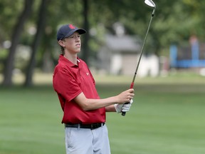 Garret Day of Chatham, Ont., plays in the Essex-Kent Junior Golf Tournament at Roseland Golf and Curling Club in Windsor, Ont., on Aug. 23, 2017. (NICK BRANCACCIO/Postmedia Network)