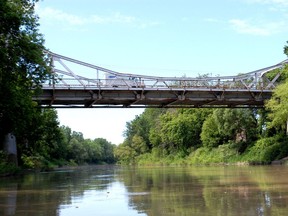 The 80-year-old bridge over the Thames River at Thamesville is to be replaced with a new span, but a Michigan man who maintains a website on historic bridges says the older bridge should be kept and maintained perhaps as a walking bridge, because of its historic importance. File photo/Postmedia Network