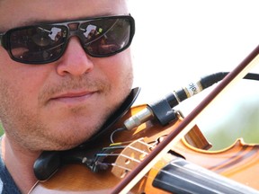 Sheldon Jaaskelainen performs at Sault Ste. Marie Canal National Historic Site's Big Picnic on June 16, 2018.