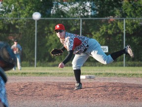 Ryan Scott delivers a pitch at the Veterans diamond in June 2014. Nugget File Photo