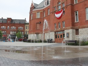 After months of being off due to design flaws, Market Square’s water feature was turned back on Monday. (JONATHAN JUHA/THE BEACON HERALD)