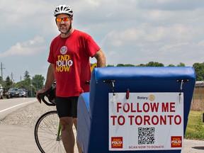 Ralph Zuke rolled through the Brantford area on Tuesday on his 1,137- kilometre cycling trek from St. Louis, Mo., to Toronto. (Brian Thompson/The Expositor)