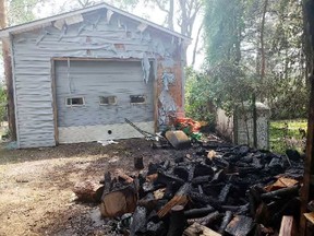 Embers from a fire pit were improperly disposed of on Lighthouse Crescent in Long Point this week. The embers sparked a fire in a wood pile which proceeded to melt plastic siding on a nearby garage. Norfolk Fire & Rescue photo