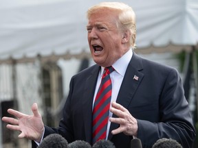 President Donald Trump on June 8, speaks to the press before departing the White House for the G7 summit. AFP PHOTO / NICHOLAS KAMMNICHOLAS KAMM/AFP/Getty Images