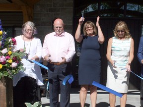 A ribbon cutting ceremony was held June 14 to mark the grand opening of Jessica's House, a three-bed residential hospice in Exeter. Pictured from left are South Huron Hospital Foundation executive director Kimberley Payne, Foundation board chairperson Pat O'Rourke, steering committee co-chairs Deb Homuth and Maria Hamather, Tim Hamather and capital campaign chairperson Rob Reid. Jessica's House is named after Tim and Maria Hamather's late daughter Jessica, who died in 2015 at the age of 22 after battling cancer. (Scott Nixon/Exeter Lakeshore Times-Advance)