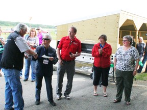 Doug Roy of the Save the Canso group (far left) accepted a cheque for $2,148 from Karin Wilson, Gord and Karla MacLeod and Elaine Stenbraaten of the Fairview Fire and Rescue Society.