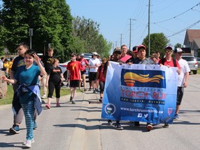 About 100 people took part in the Law Enforcement torch Run, Wednesday, in North Bay.
PJ Wilson/The Nugget