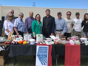 Minister Carlier and Associate Minister of Health Brandy Payne announce Local Food Council recruitment with industry partners at a Calgary urban farm.