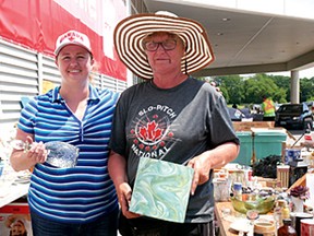 Cara Voisin and Judy Legg coordinated the 2018 community yard sale in Tillsonburg last weekend. (Chris Abbott/Tillsonburg News)