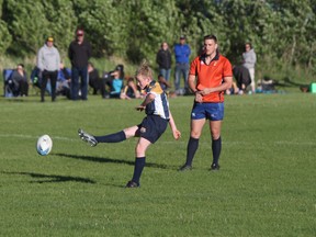 Caleb Graham goes for the extra point during a rugby game with his U13 Bow Valley Rugby (BVRC) Grizzlies team.