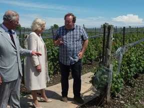 Canadian Press File Photo
Prince Charles and Camilla Duchess of Cornwall speak with Norman Hardie as they visit his winery in Wellington last summer. Hardie issued an apology Wednesday following a damning report alleging sexual misconduct at his Prince Edward County business.