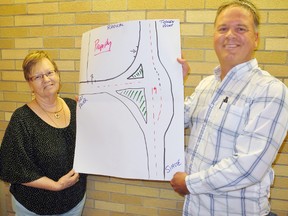 The Lynn Valley Lions are regrouping after Norfolk council this week denied their plan to serve hot meals at the south-east corner of Highway 24 and Highway 6 south of Simcoe during next month’s Friday the 13th motorcycle event. At left is club president Ingrid Coppens while at right is treasurer Jeff Sidway. MONTE SONNENBERG / SIMCOE REFORMER