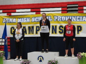 Photo submitted
Sexsmith high-school student Keyana Anderson, centre, won gold at the high school provincial discus event in Red Deer a few weeks back.