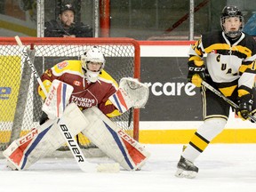 Timmins Majors goalie Dylan Dallaire prepares to stop a shot from the point as New Liskeard Cubs forward Jarrett Angelicchio looks on during a GNML contest at the McIntyre Arena on Dec. 21. The Majors will entertain the Cubs during their 2018-19 home opener at the McIntyre Arena on Friday, Sept. 21, after playing the first three games of the campaign on the road — in Sault Ste. Marie on Sept. 7 and Sept. 8 and in Kapuskasing on Sept. 18. The Majors exhibition schedule will include a number of games at the Polar Bear Classic in Cochrane, from Aug. 31-Sept. 2.  THOMAS PERRY/THE DAILY PRESS