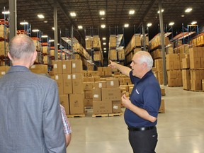 Samsonite Canada general manager Paul DeCorso explains the larger dimensions of the company’s new warehouse on Thursday, June 21, 2018 in Stratford, Ont. (Terry Bridge/Stratford Beacon Herald)