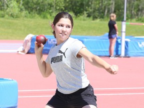 Chloe Luomas of Felix Ricard competes in the shot put at the Conseil scolaire catholique du Nouvel-Ontario grade 7 and 8 elementary track meet at the Laurentian Community Track in Sudbury, Ont. on Wednesday June 20, 2018. Some 700 students from over 15 Greater Sudbury schools will gather on the Laurentian University athletic track to take part in this annual friendly competition. Grade 7 and 8 students will compete on Wednesday, June 20, whereas the Friday, June 22, competition will attract grade 4, 5 and 6 students. Gino Donato/Sudbury Star/Postmedia Network