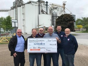 Members of the committee accept Goderich Elevators' donation from Local
Manager, Calvin Kerr and Regional Manager, Brad Walker. (Contributed photo)