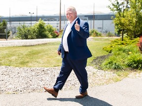 Ontario premier-designate Doug Ford leaves after announcing his commitment to keeping the Pickering Nuclear Generating Station in operation until 2024 in Pickering, Ont., on Thursday, June 21, 2018. THE CANADIAN PRESS/Nathan Denette